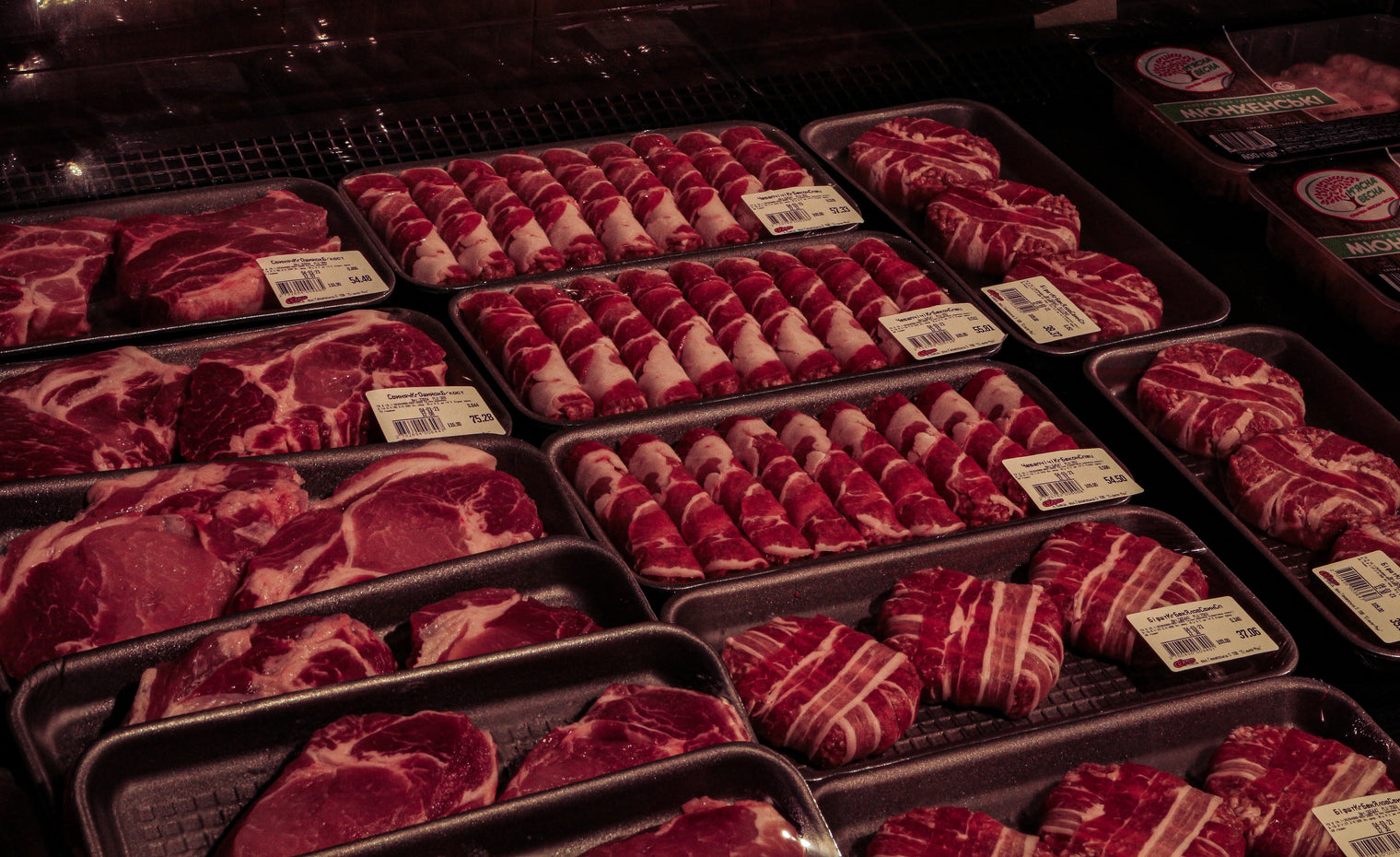 Meat in supermarket display case. 